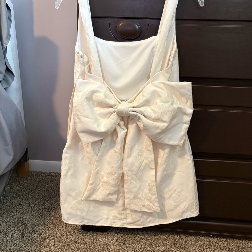 Lulus 
Flirtatious Poise Ivory Jacquard Bow Back Mini Dress - Picture 2 of 9
